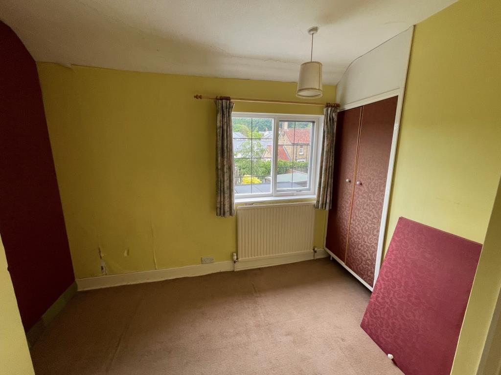 Lot: 20 - THREE-BEDROOM COTTAGE FOR IMPROVEMENT - Bedroom 2 with Boiler Cupboard and window to rear